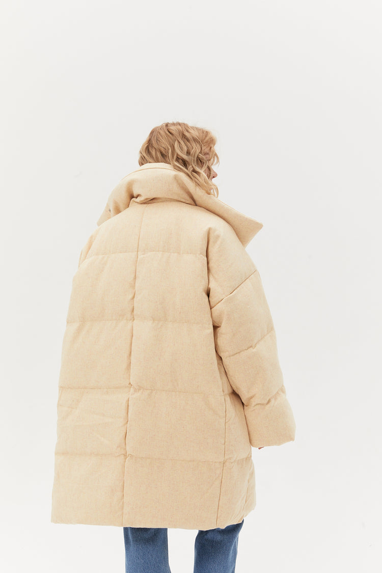 Cream-colored down jacket
