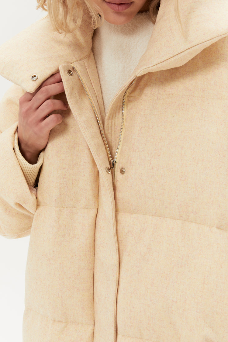 Cream-colored down jacket
